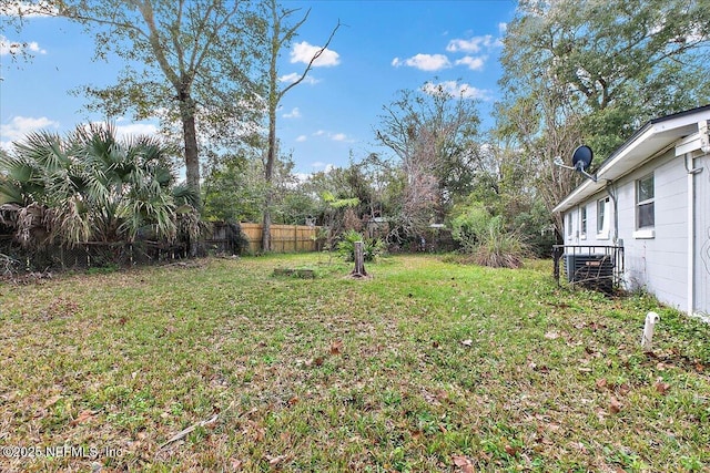 view of yard with central AC