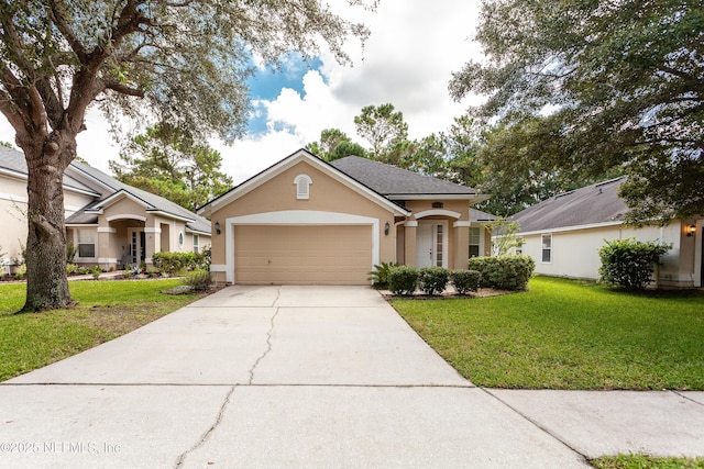 view of front facade featuring a garage and a front yard