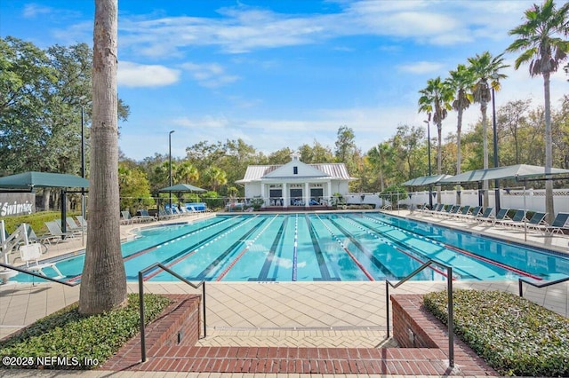 view of swimming pool featuring a patio