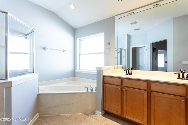 bathroom featuring vanity, tile patterned flooring, vaulted ceiling, and shower with separate bathtub