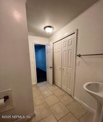 bathroom with tile patterned flooring