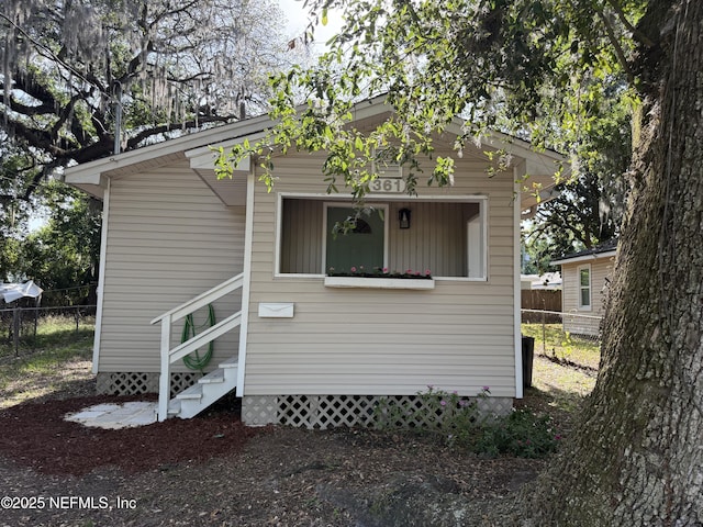 361 Broward St, Jacksonville, FL 32204 - view of home's exterior featuring fence and entry steps