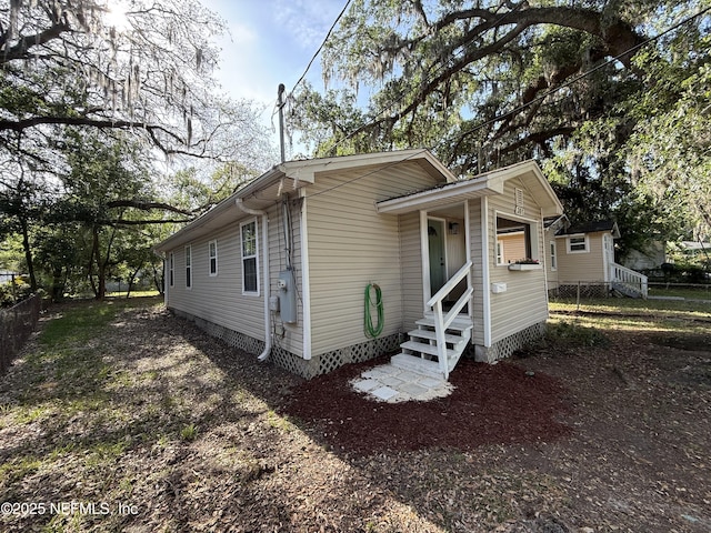 361 Broward St, Jacksonville, FL 32204 - view of front of house featuring fence, entry steps, and crawl space