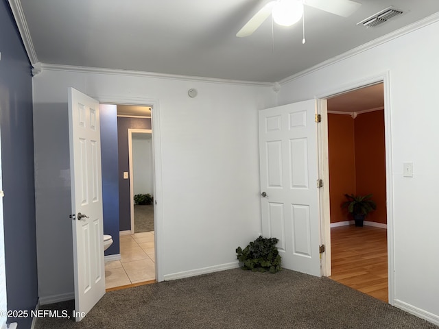 361 Broward St, Jacksonville, FL 32204 - unfurnished bedroom featuring baseboards, visible vents, carpet floors, and crown molding