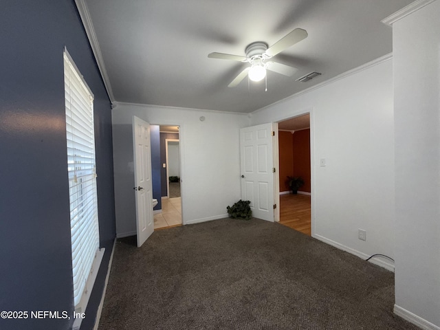 361 Broward St, Jacksonville, FL 32204 - unfurnished bedroom featuring carpet flooring, baseboards, visible vents, a ceiling fan, and crown molding