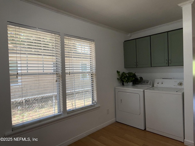 361 Broward St, Jacksonville, FL 32204 - washroom featuring light wood finished floors, cabinet space, separate washer and dryer, crown molding, and baseboards