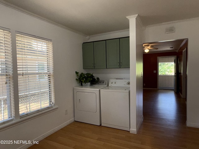 361 Broward St, Jacksonville, FL 32204 - washroom with cabinet space, light wood-style floors, washing machine and dryer, ceiling fan, and crown molding