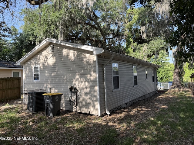 361 Broward St, Jacksonville, FL 32204 - view of home's exterior featuring fence and central AC unit