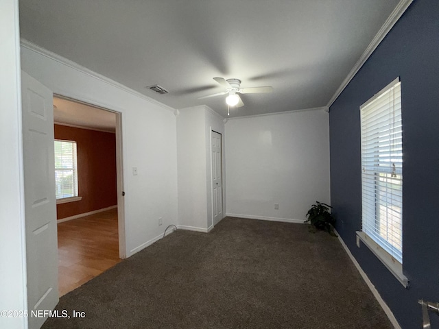 361 Broward St, Jacksonville, FL 32204 - carpeted empty room featuring baseboards, visible vents, ceiling fan, and crown molding