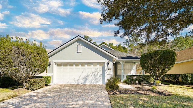 view of front of property with a garage