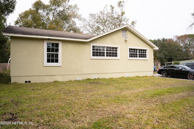 view of property exterior featuring a yard