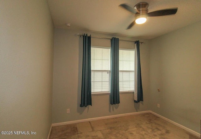 unfurnished room featuring ceiling fan