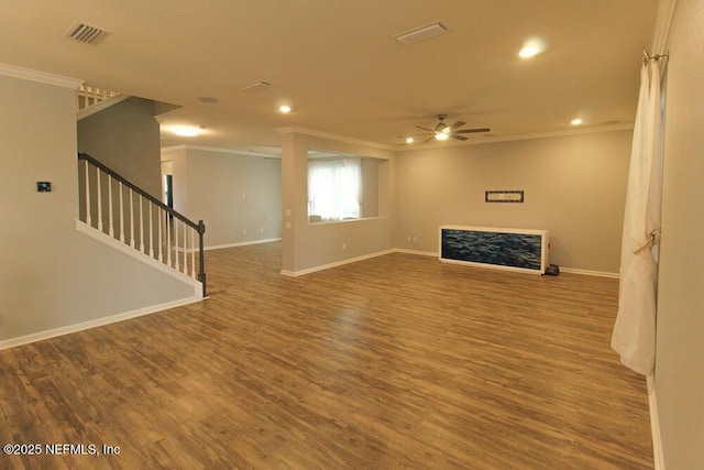 unfurnished living room featuring crown molding, ceiling fan, and hardwood / wood-style flooring