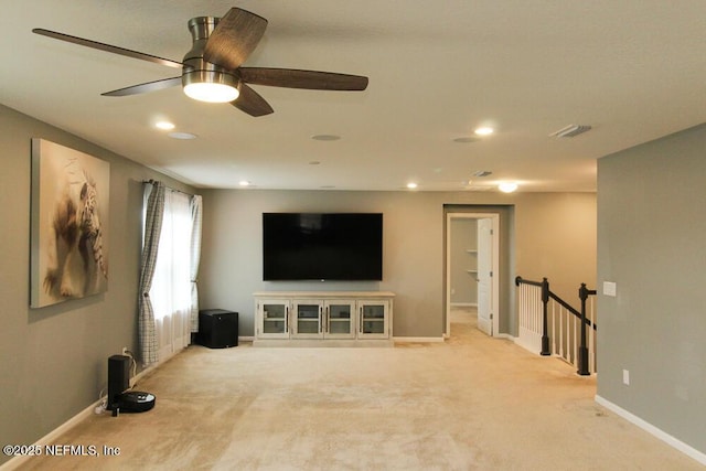 unfurnished living room featuring light colored carpet