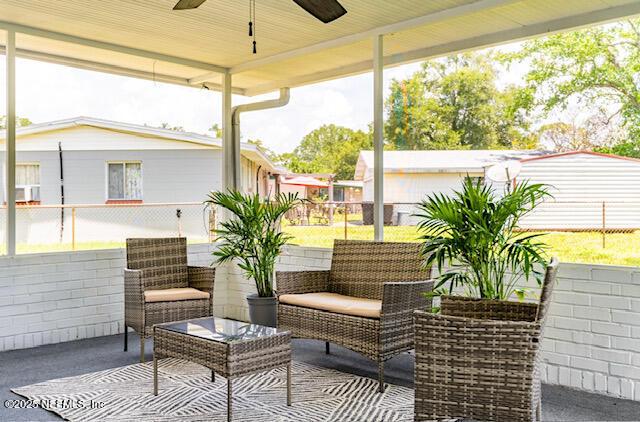 view of patio / terrace featuring ceiling fan and outdoor lounge area