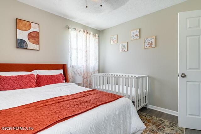 bedroom featuring hardwood / wood-style floors