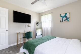 bedroom featuring ceiling fan and wood-type flooring