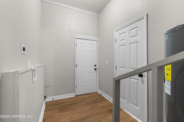 doorway featuring electric water heater and hardwood / wood-style floors