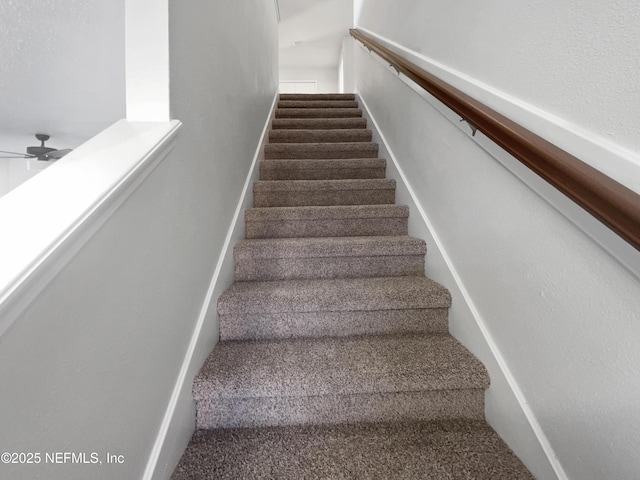 stairs with ceiling fan