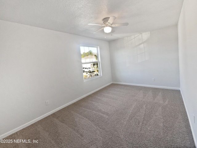 unfurnished room featuring a textured ceiling, ceiling fan, and carpet