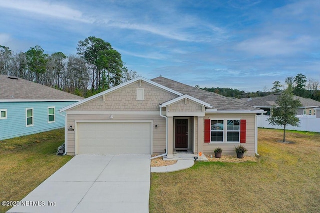 single story home featuring a front yard and a garage