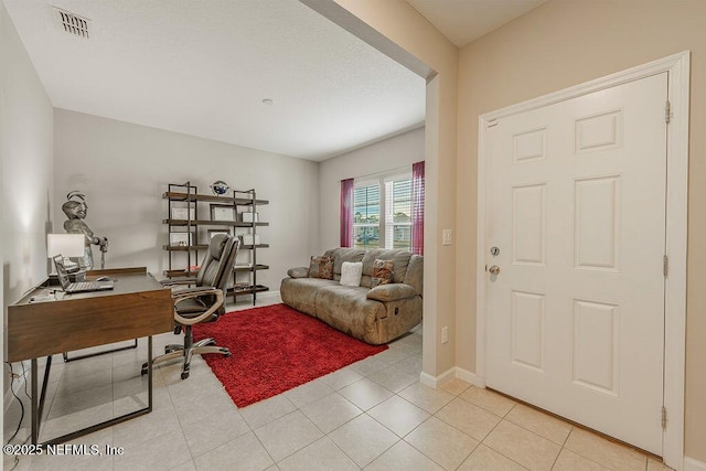 office space featuring light tile patterned floors