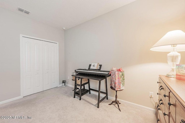 office featuring light colored carpet