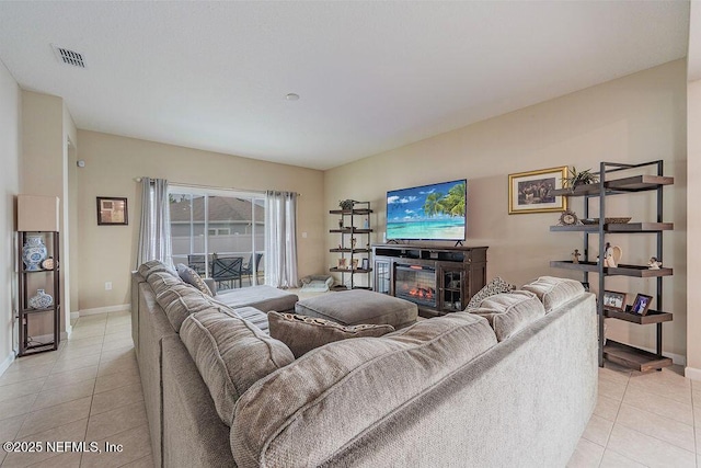 living room featuring light tile patterned floors