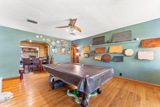 playroom with hardwood / wood-style flooring, pool table, and ceiling fan