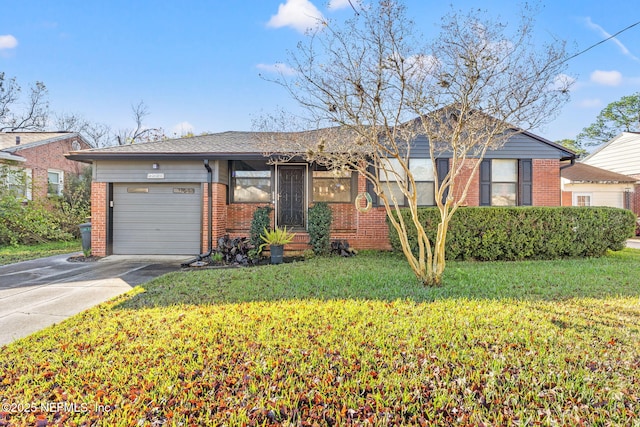 single story home with a front yard and a garage