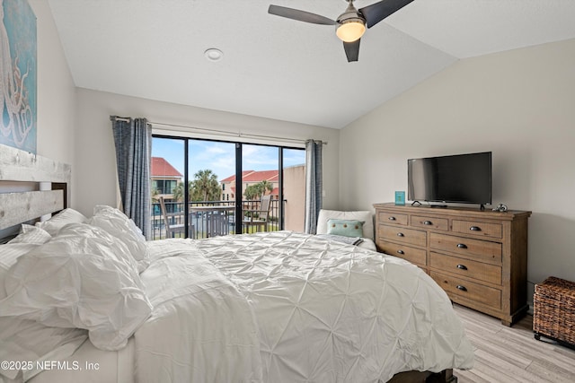 bedroom with ceiling fan, access to exterior, vaulted ceiling, and light wood-type flooring