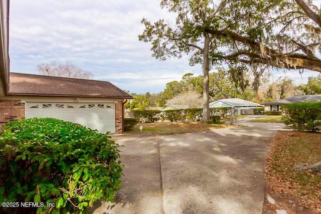 view of side of property with a garage