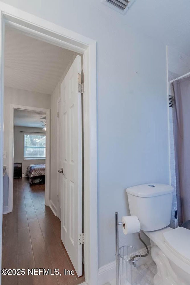 bathroom featuring toilet