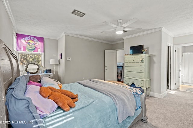 carpeted bedroom with ceiling fan, a textured ceiling, and crown molding