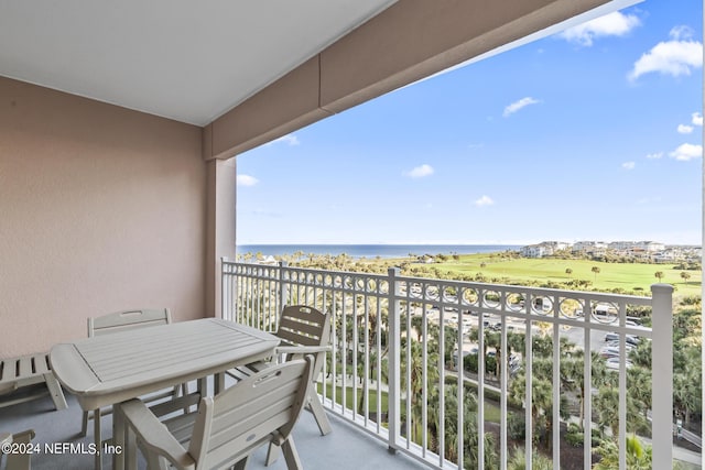 balcony featuring a water view