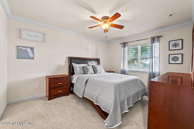 bedroom with light carpet, ceiling fan, crown molding, and a textured ceiling