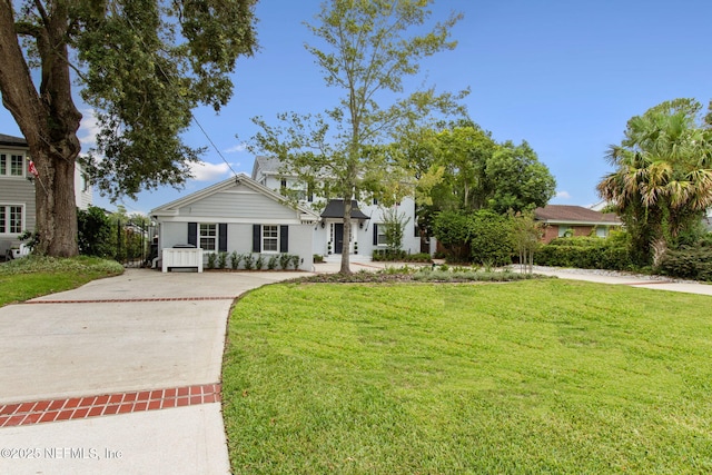 view of front of home with a front yard