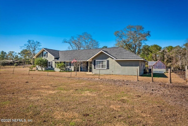 ranch-style home with a front yard