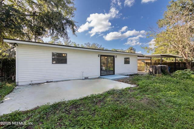 rear view of house featuring a patio area