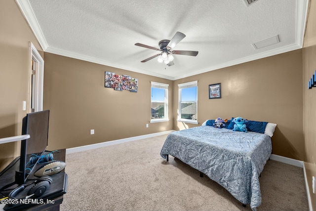 bedroom with ceiling fan, a textured ceiling, crown molding, and carpet flooring