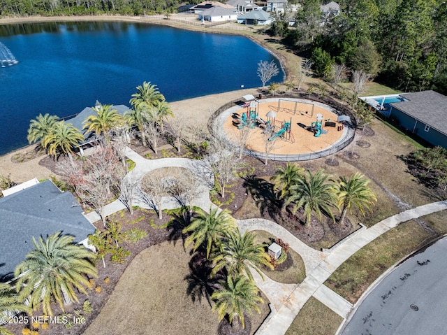 birds eye view of property featuring a water view