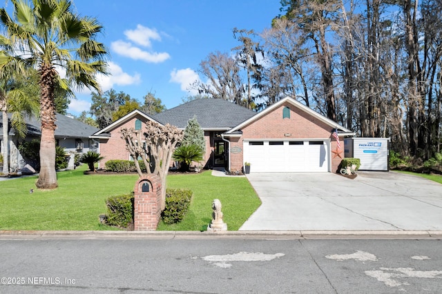 view of front of house featuring a garage and a front lawn