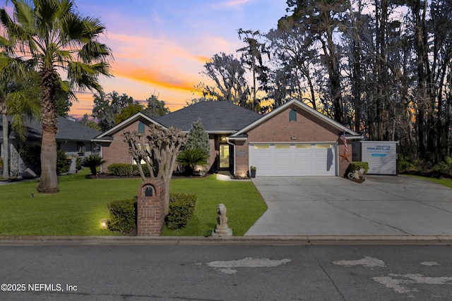 view of front of home with a lawn