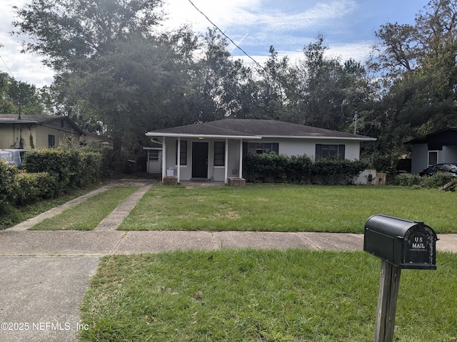 view of front facade with a porch and a front yard