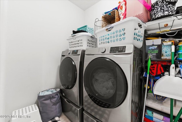 washroom with separate washer and dryer