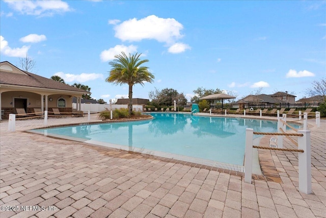 view of swimming pool featuring a patio