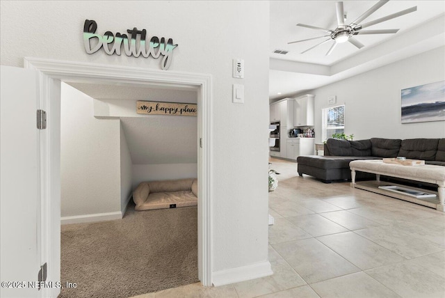 hallway featuring light tile patterned flooring