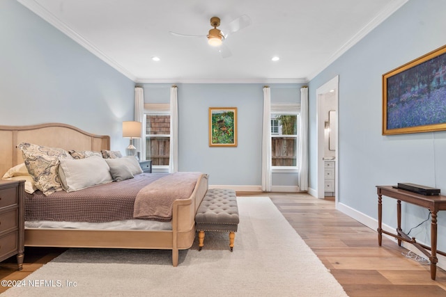 bedroom with light wood-type flooring, ceiling fan, and ornamental molding