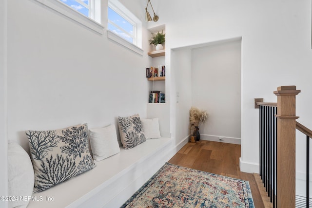 sitting room with hardwood / wood-style floors