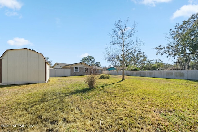 view of yard with a storage shed